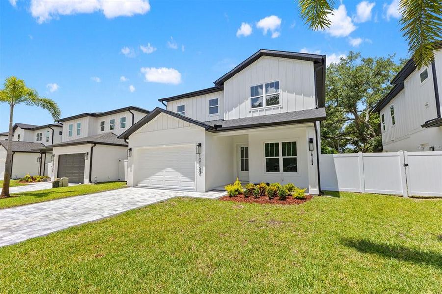 Front exterior of a new home in , Seminole, FL, highlighting curb appeal (Image 28). Front exterior of a new home in , Seminole, FL, highlighting curb appeal (Image 28).