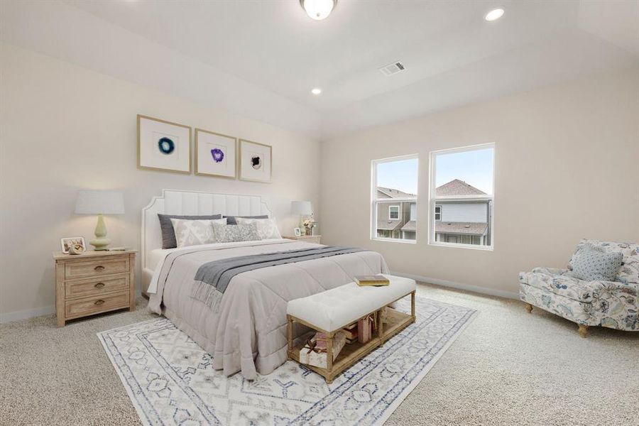 What a wonderful place to come home to, this stunning primary suite greets you with plush carpet floors, a warm neutral paint, high ceilings, lovely windows allowing in natural light brightening up this spacious primary bedroom, with extra space for a seating area.