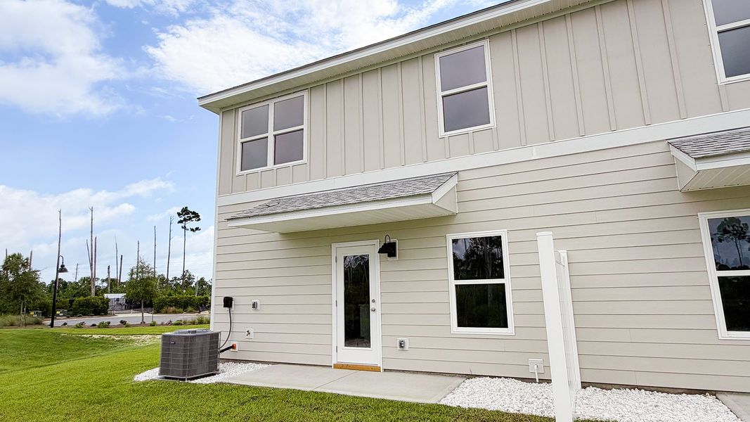 Exterior details and patio area of a home in WindMark Beach, Port Saint Joe (Image 27).