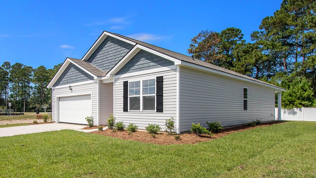 Front exterior of a new home in Preserve at Cypress Commons, Conway, SC, highlighting curb appeal (Image 2).