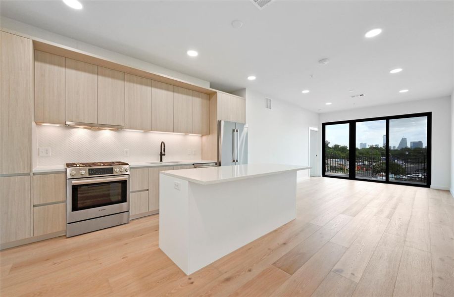 Furnished interior view inside a new home in One Oak, Austin (Image 6).