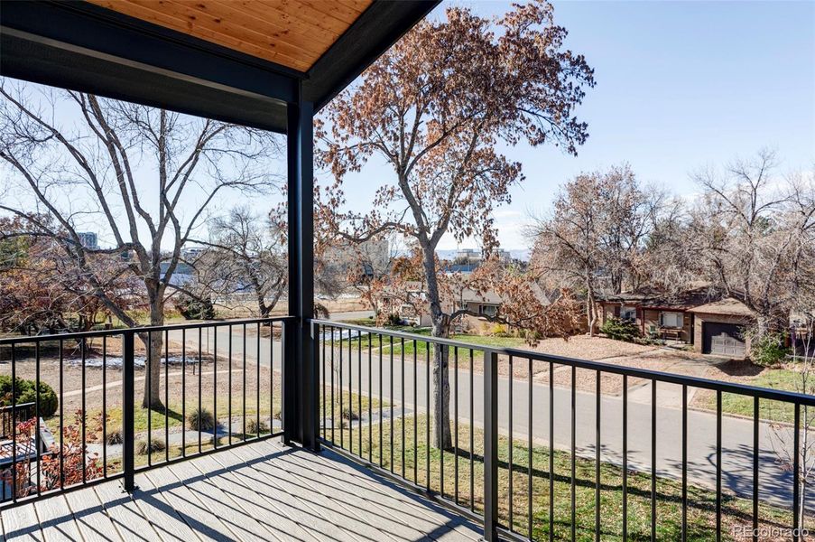 Primary suite private patio with a peek at the mountains