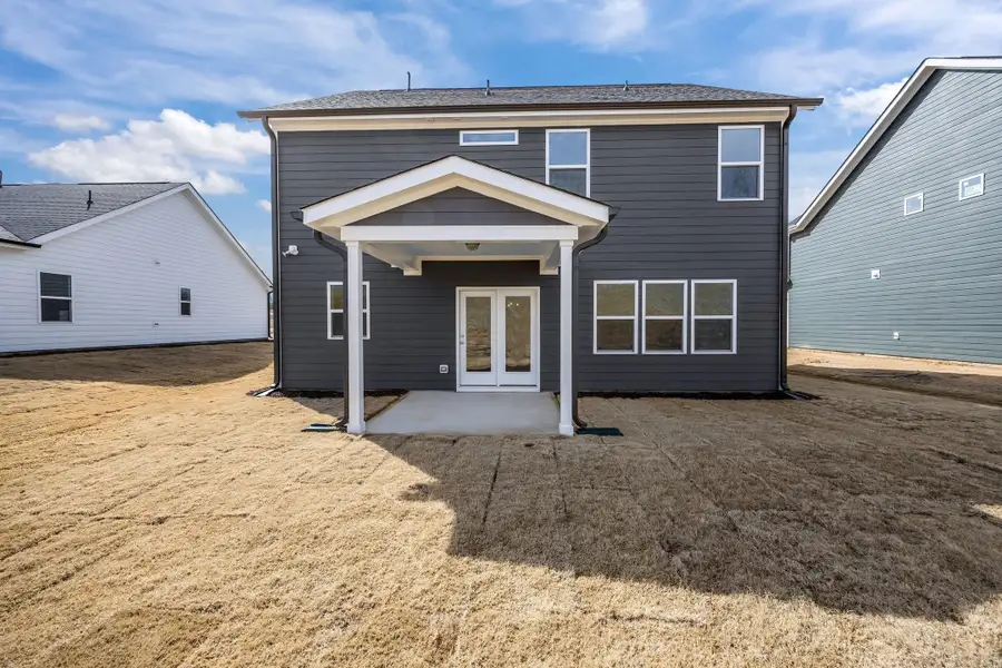 Representative exterior details of a home built from the Blue Satin Sashes by Garman Homes in Spring Valley, Trinity (Image 3).