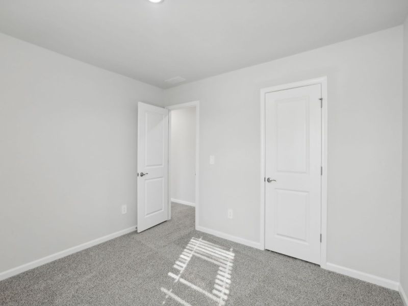 Secondary bedroom in the Chatham floorplan at 250 White Birch Lane in Angier, NC.