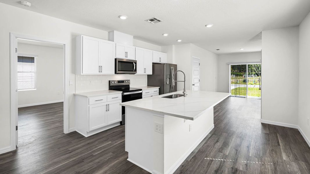Representative furnished interior of a home built from the ASTOR by D.R. Horton in Harmony at Lake Eloise, Winter Haven (Image 3).