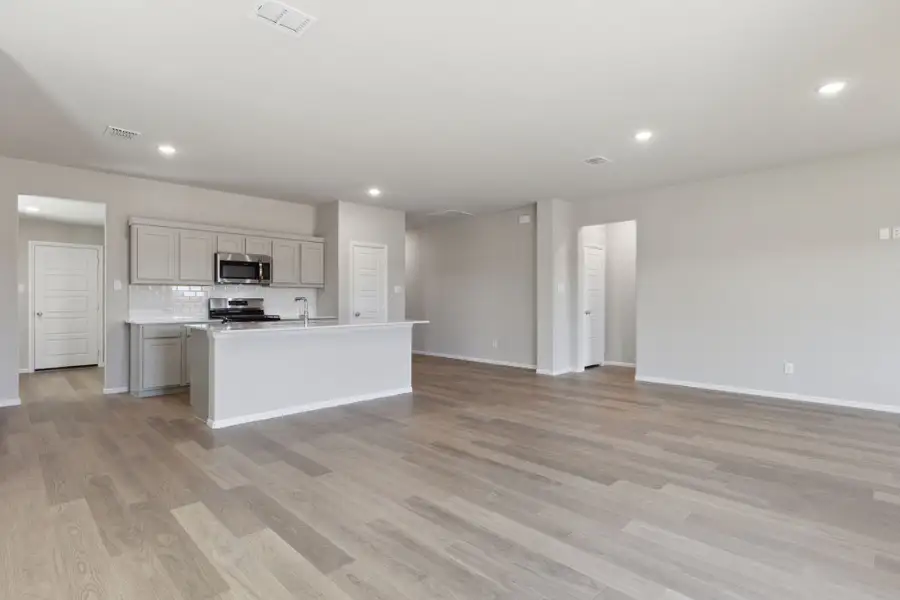 Open Floor Plan in the Harrison home plan by Trophy Signature Homes – REPRESENTATIVE PHOTO Open Floor Plan in the Harrison home plan by Trophy Signature Homes – REPRESENTATIVE PHOTO