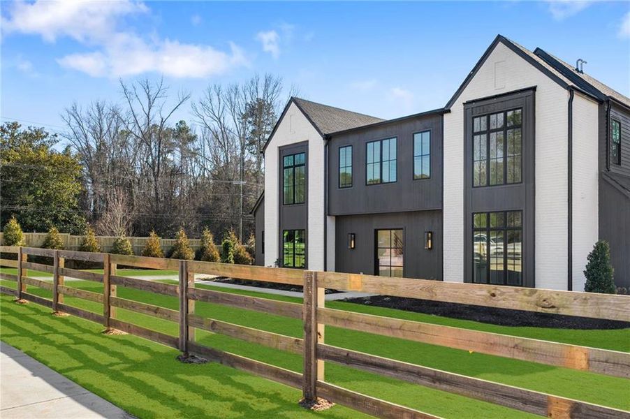 Front exterior of a new home in , Roswell, GA, highlighting curb appeal (Image 30).