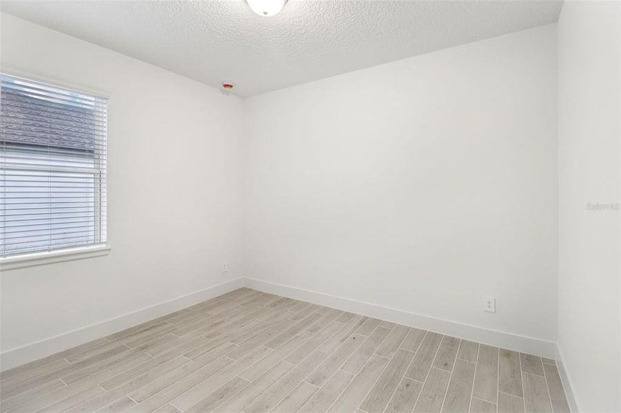 Spacious, unfurnished interior of a new home in Ridgehaven - Reserve Series, Ormond Beach (Image 34).