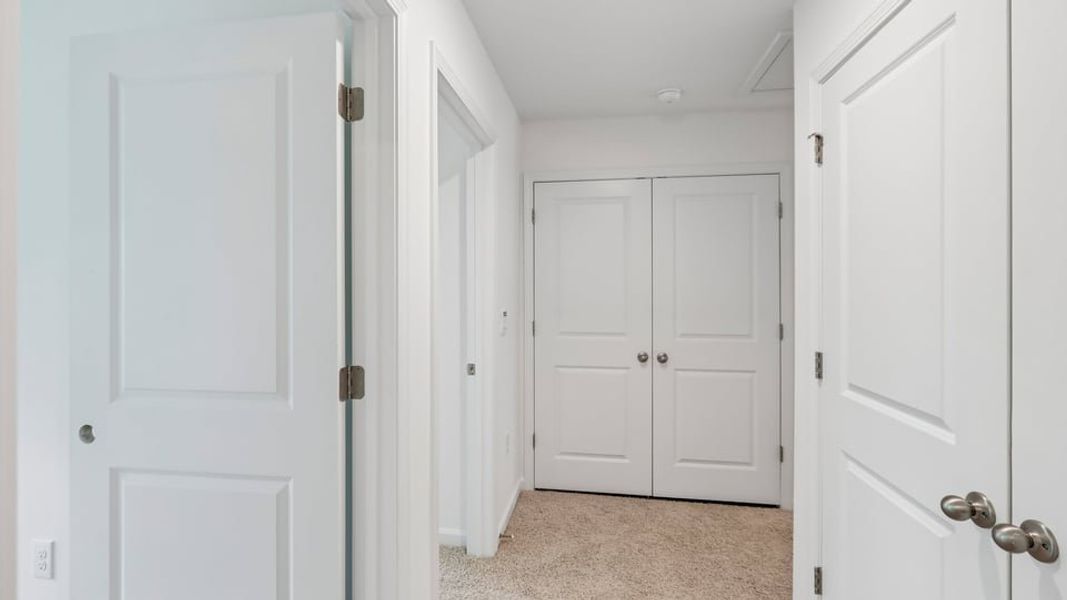 Spacious, unfurnished interior of a new home in The Townes at Belle Grove, Wendell (Image 10).