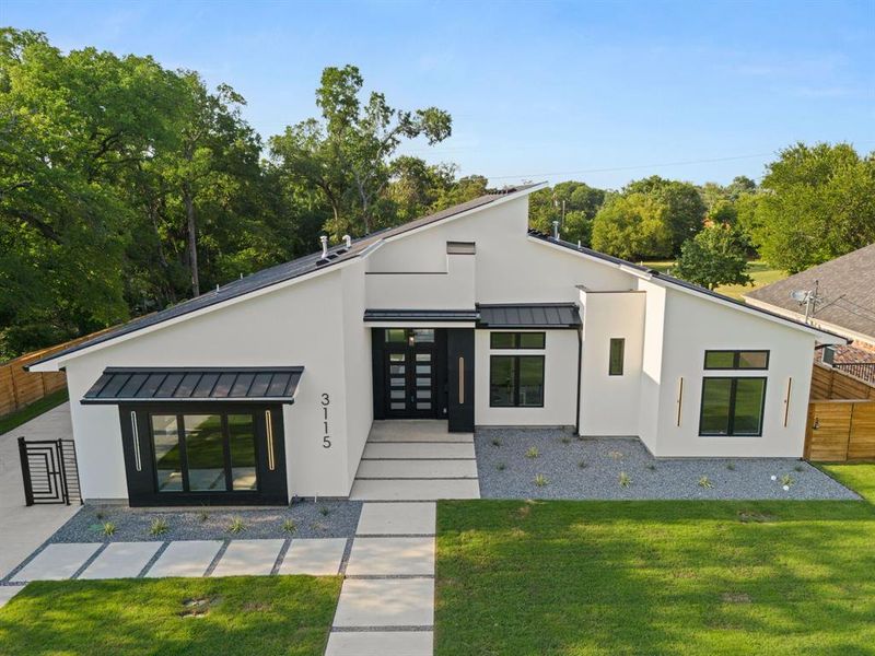 Front exterior of a new home in , Dallas, TX, highlighting curb appeal (Image 21).