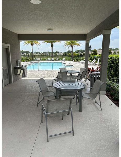 Exterior details and patio area of a home in Windrose, Apopka (Image 3).