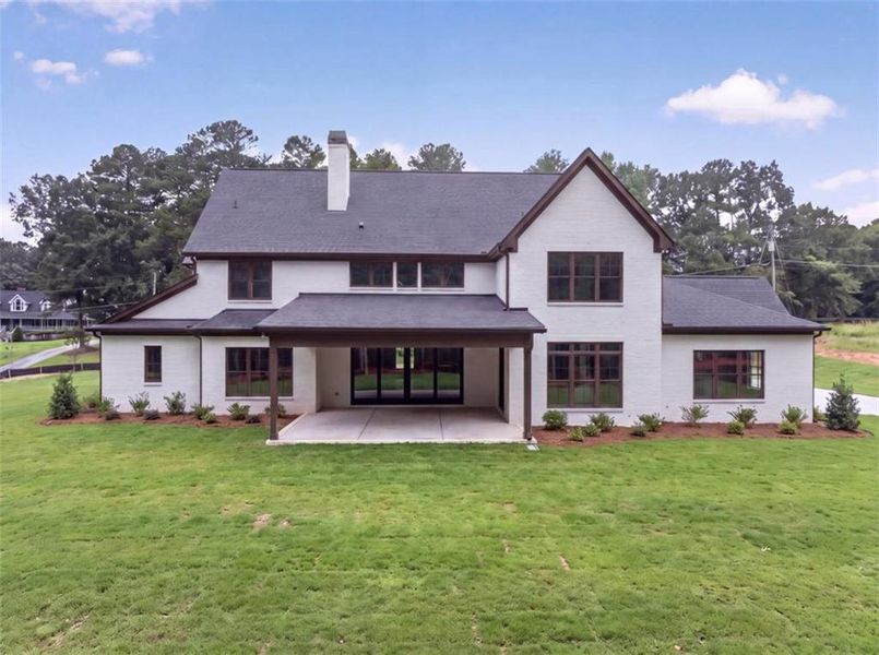 Front exterior of a new home in , Loganville, GA, highlighting curb appeal (Image 5). Front exterior of a new home in , Loganville, GA, highlighting curb appeal (Image 5).