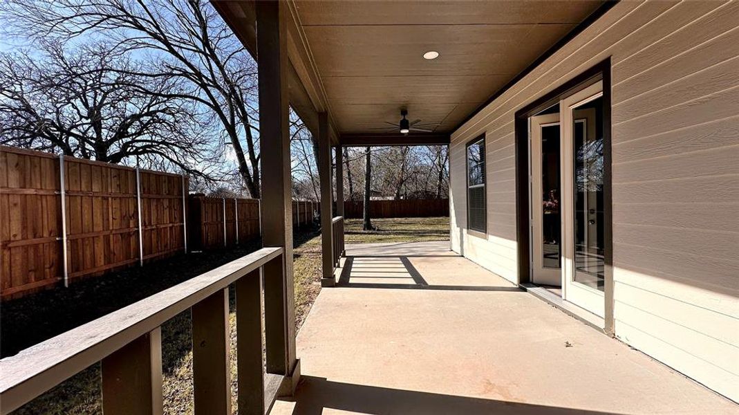 Expansive patio with fans and French door access