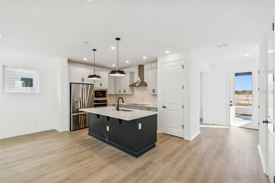 Furnished interior view inside a new home in Weslyn Park in Sunbridge 34', St. Cloud (Image 12).