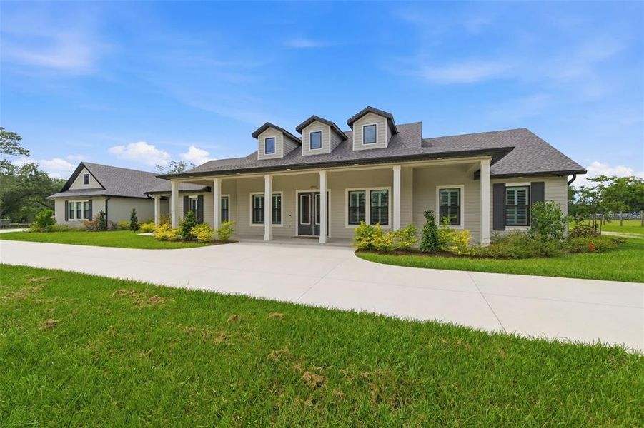 Front exterior of a new home in , Dade City, FL, highlighting curb appeal (Image 27). Front exterior of a new home in , Dade City, FL, highlighting curb appeal (Image 27).