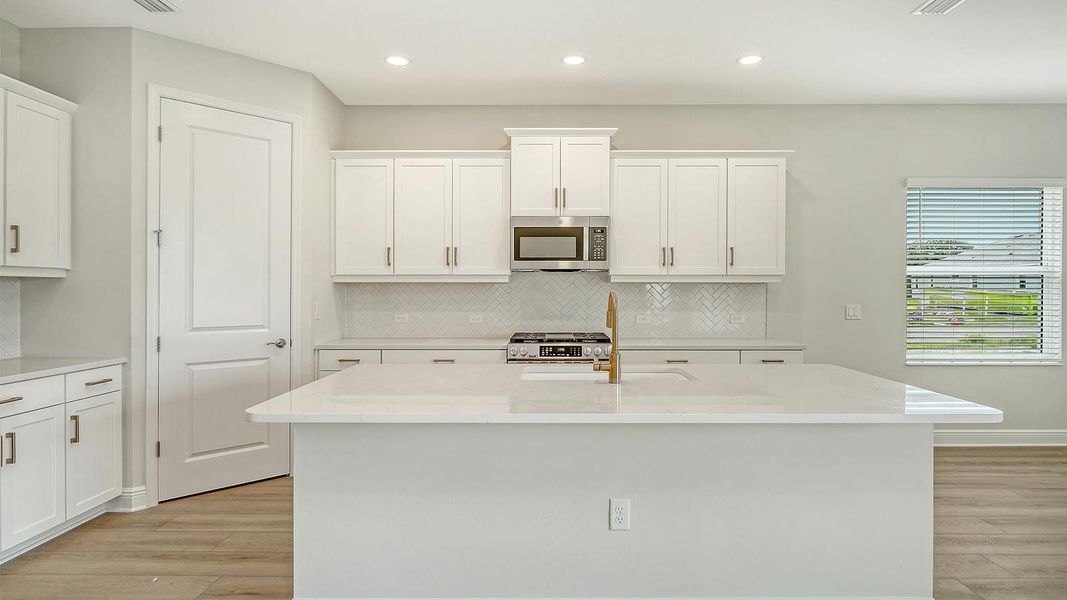 Furnished interior view inside a new home in Wildleaf Real Estate and Homes for Sale in Parrish, FL - Neal Communities, Parrish (Image 7).