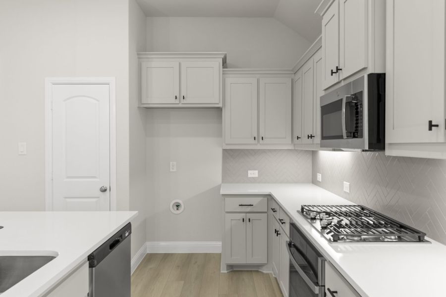 Furnished interior view inside a new home in La Terra at Uptown Celina, Celina (Image 7).