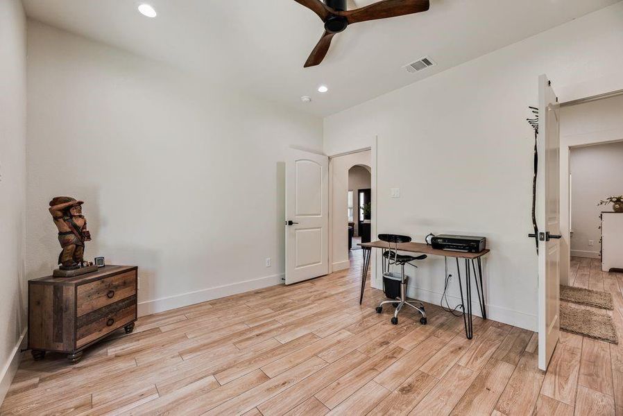 Large Secondary Bedroom being used as an office space