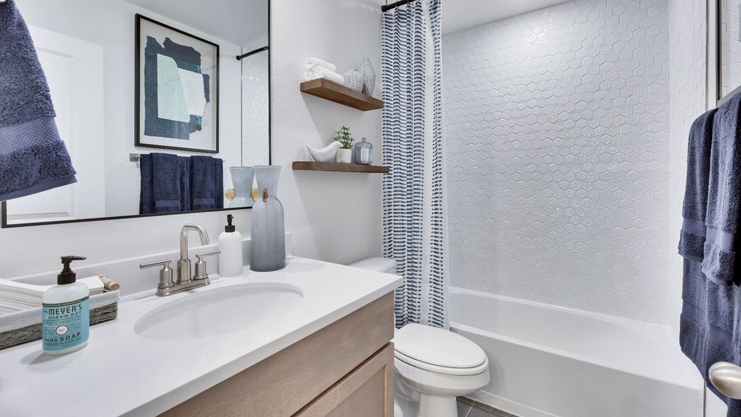Representative furnished interior of a home built from the Meyerson by DRB Homes in Infinity Square, Kyle (Image 41).