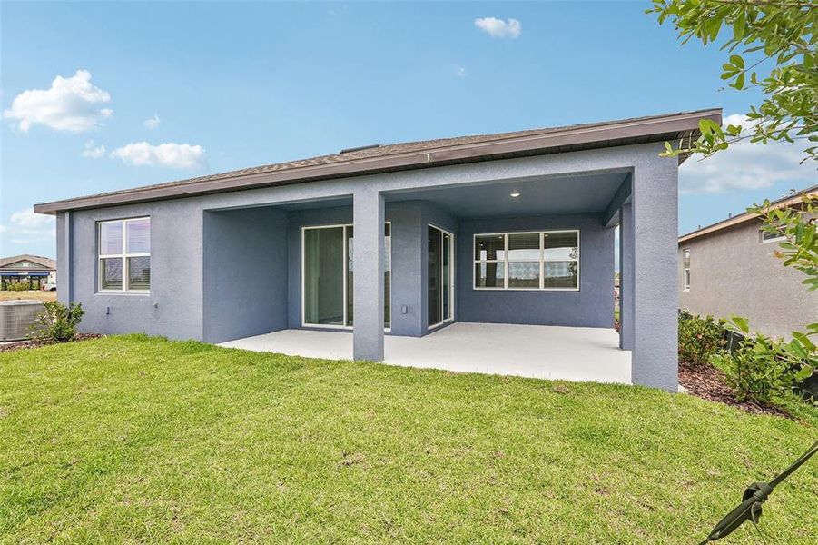 Exterior details and patio area of a home in Seaire, Parrish (Image 20).