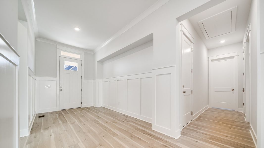 Gorgeous white painted and trimmed interior hallway
