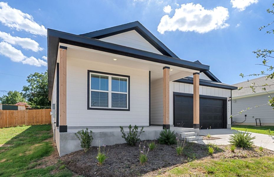 Front exterior of a new home in Skyview, Belton, TX, highlighting curb appeal (Image 24). Front exterior of a new home in Skyview, Belton, TX, highlighting curb appeal (Image 24).