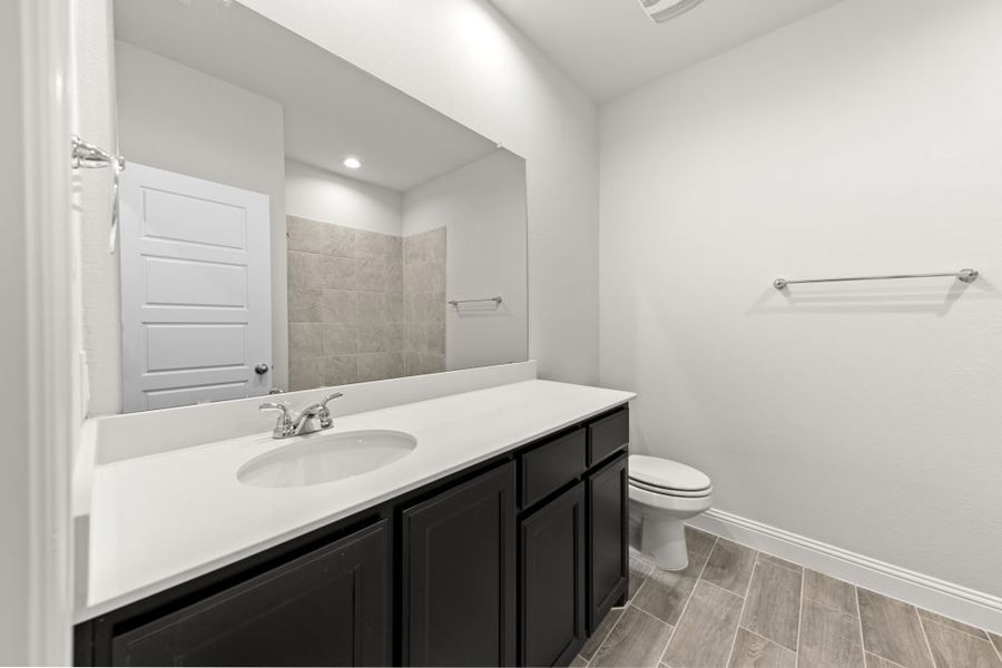 Representative exterior photo of a completed home built from the Kingston by Impression Homes in Arcadia Trails, Balch Springs, TX (Image 26).