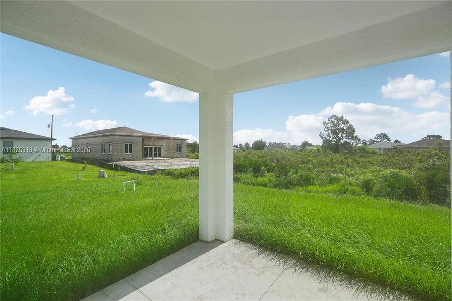 Exterior details and patio area of a home in , Lehigh Acres (Image 25). Exterior details and patio area of a home in , Lehigh Acres (Image 25).