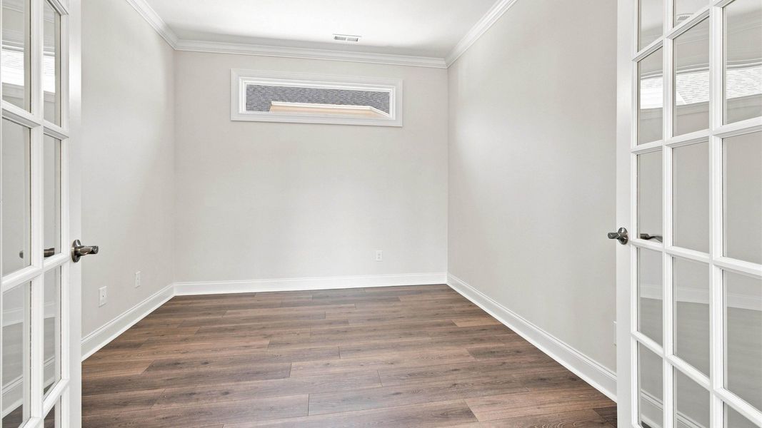 Spacious, unfurnished interior of a new home in The Courtyards at Hodges Farm, Charlotte (Image 15).