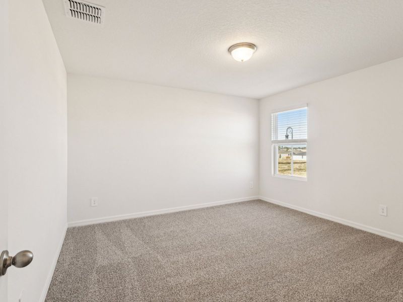 Spacious, unfurnished interior of a new home in Crosswinds - Classic Series, Haines City (Image 8).