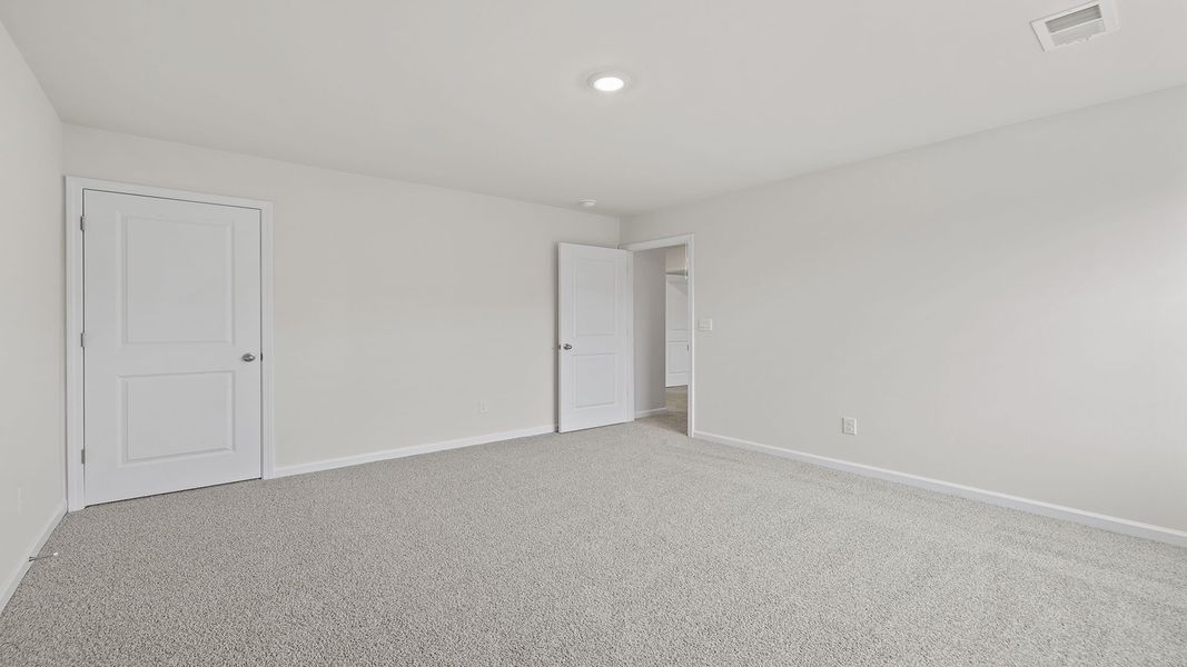 Spacious, unfurnished interior of a new home in Bentley Park, Greenwood (Image 25).