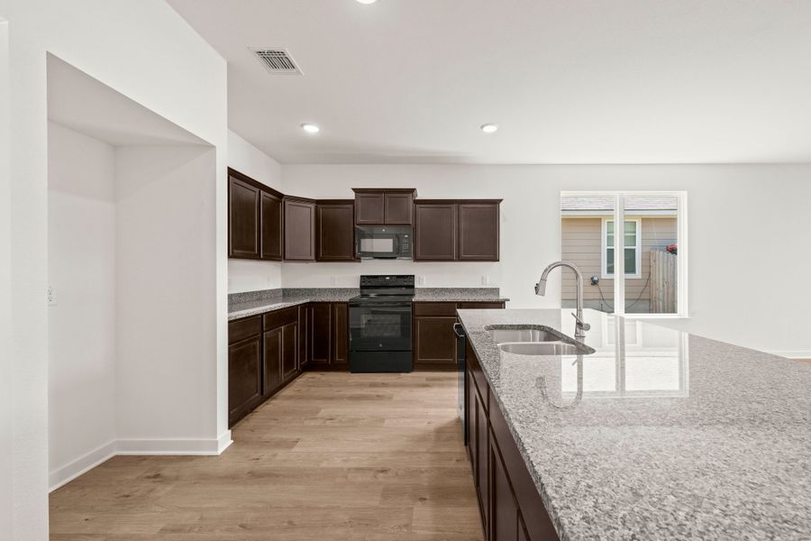 Furnished interior view inside a new home in The Village at Elm Creek, Troy (Image 4). Furnished interior view inside a new home in The Village at Elm Creek, Troy (Image 4).