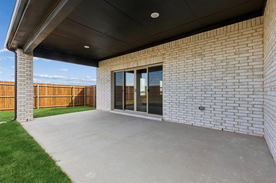 Exterior details and patio area of a home in Parks at Foster Crossing - Signature Series, Anna (Image 4).