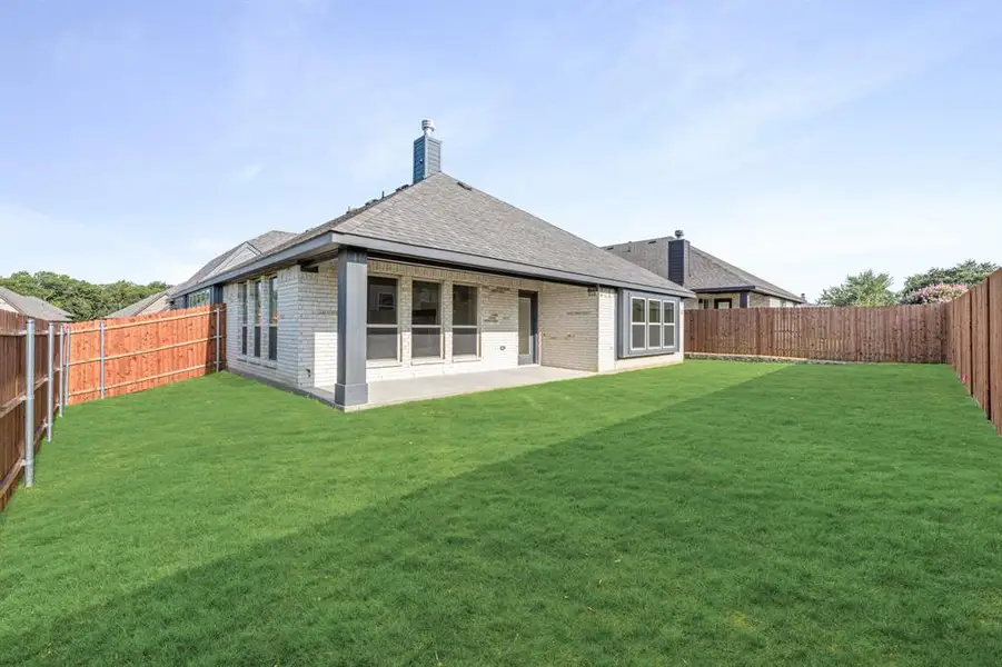 Front exterior of a new home in Sunset Ridge, Alvarado, TX, highlighting curb appeal (Image 1).