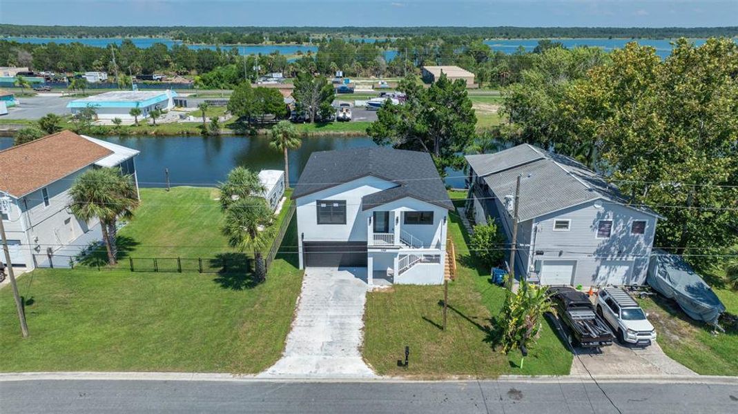 Front exterior of a new home in , Hernando Beach, FL, highlighting curb appeal (Image 18).