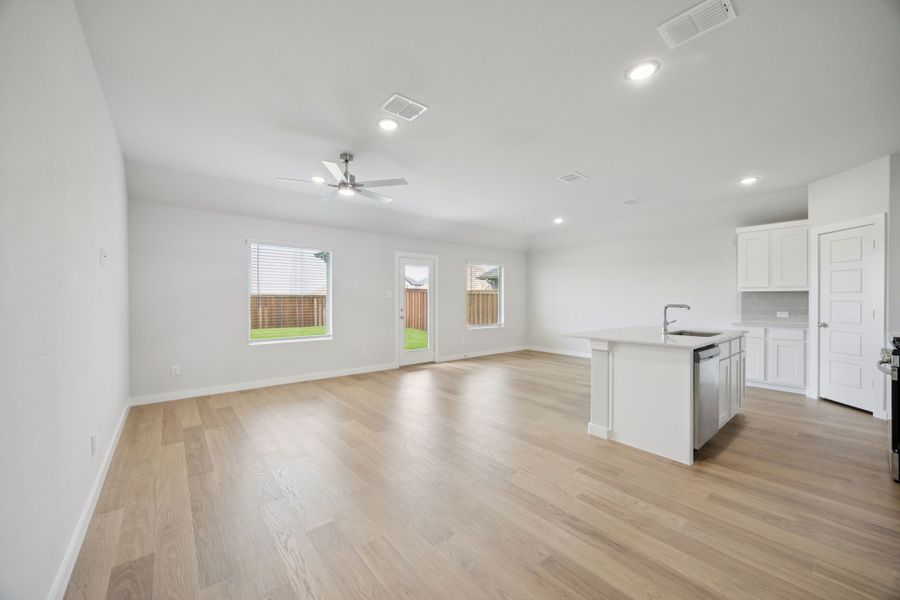 Open Floor Plan in the Hadley home plan by Trophy Signature Homes – REPRESENTATIVE PHOTO Open Floor Plan in the Hadley home plan by Trophy Signature Homes – REPRESENTATIVE PHOTO