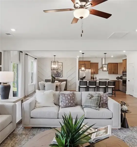 An open-concept living area flows seamlessly into An open-concept living area flows seamlessly into