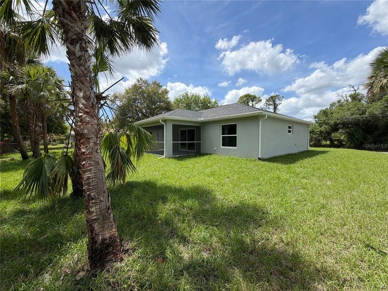 Exterior details and patio area of a home in , North Port (Image 23).