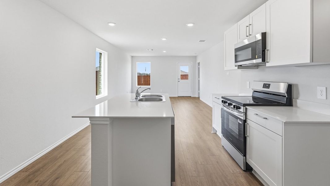 Representative furnished interior of a home built from the Atlanta by D.R. Horton in Leonard Crossing, Leonard (Image 7).