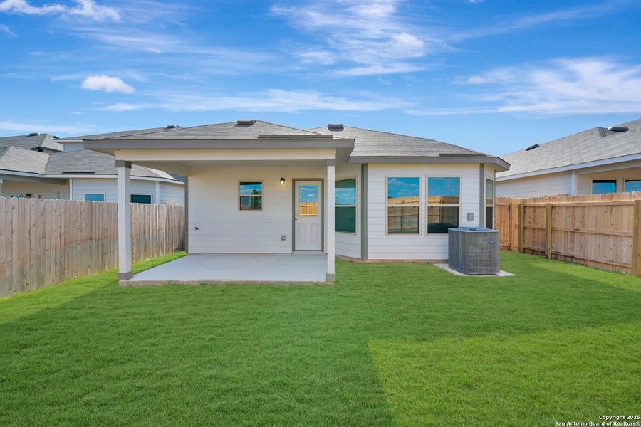 Exterior details and patio area of a home in Park Place, New Braunfels (Image 3). Exterior details and patio area of a home in Park Place, New Braunfels (Image 3).