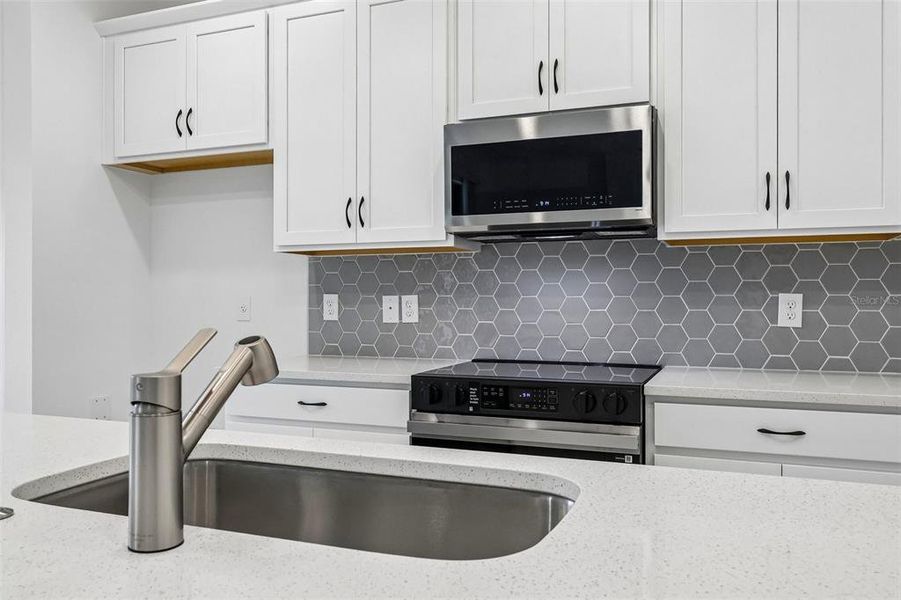 Furnished interior view inside a new home in Trinity Place, St. Cloud (Image 9).