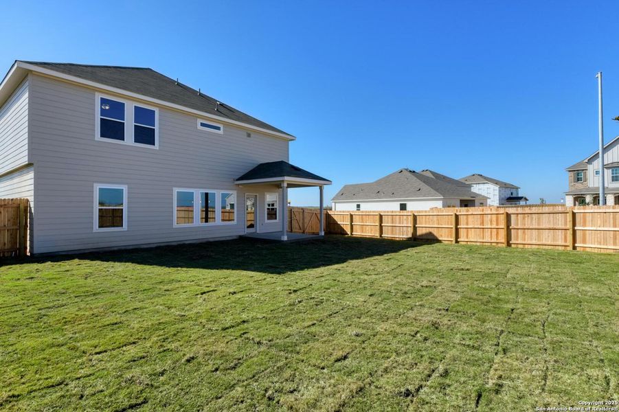 Exterior details and patio area of a home in The Preserve at the Wilder, Adkins (Image 4).