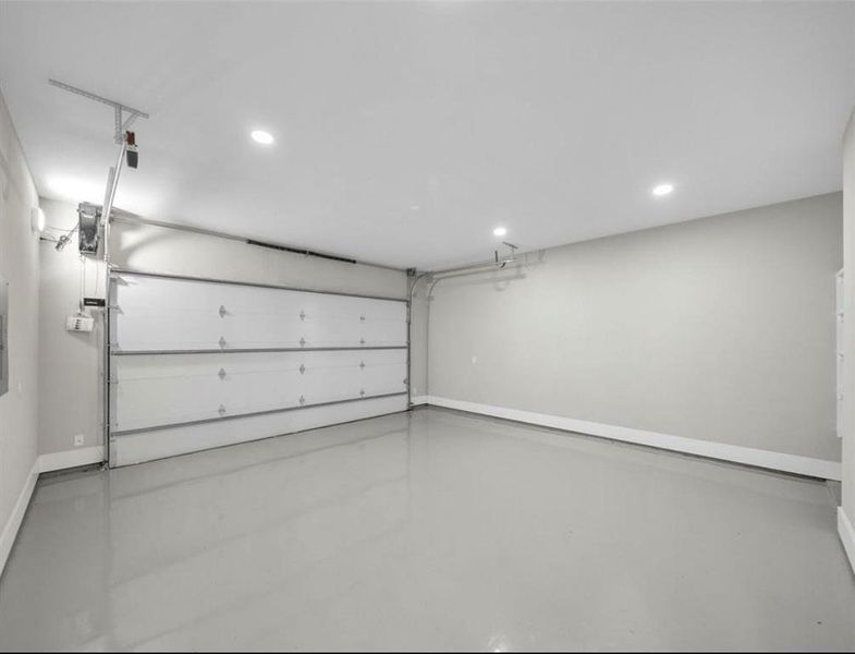 Garage with Built In's and Epoxy Flooring