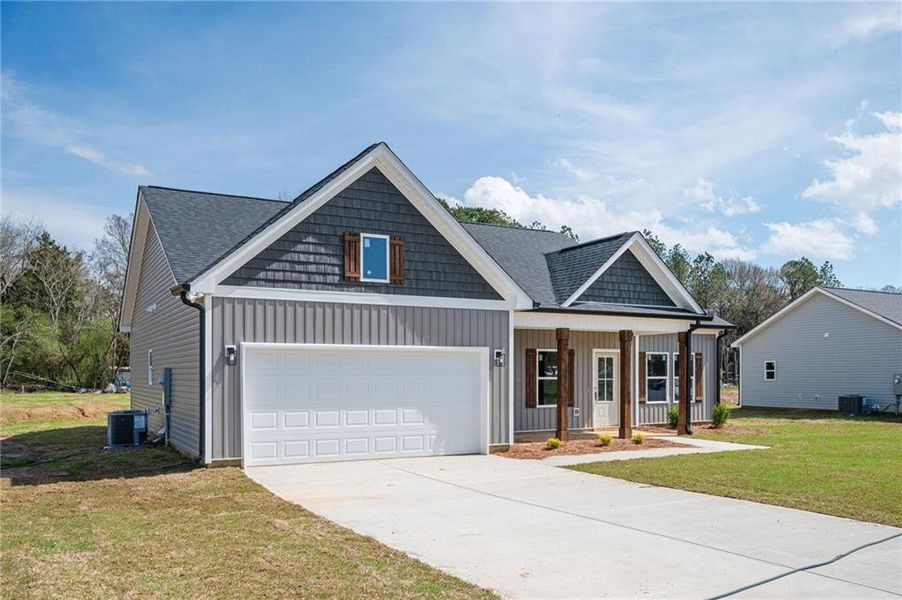 Front exterior of a new home in , Mount Zion, GA, highlighting curb appeal (Image 1). Front exterior of a new home in , Mount Zion, GA, highlighting curb appeal (Image 1).