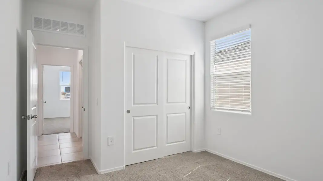 Spacious, unfurnished interior of a new home in Heartland Ranch, Coolidge (Image 20).