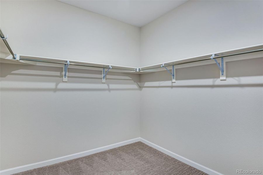 Spacious, unfurnished interior of a new home in Ensemble at The Aurora Highlands, Aurora (Image 18).