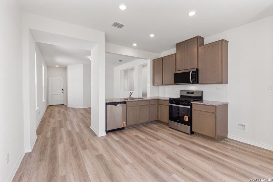 Furnished interior view inside a new home in Punta Verde, Converse (Image 12).
