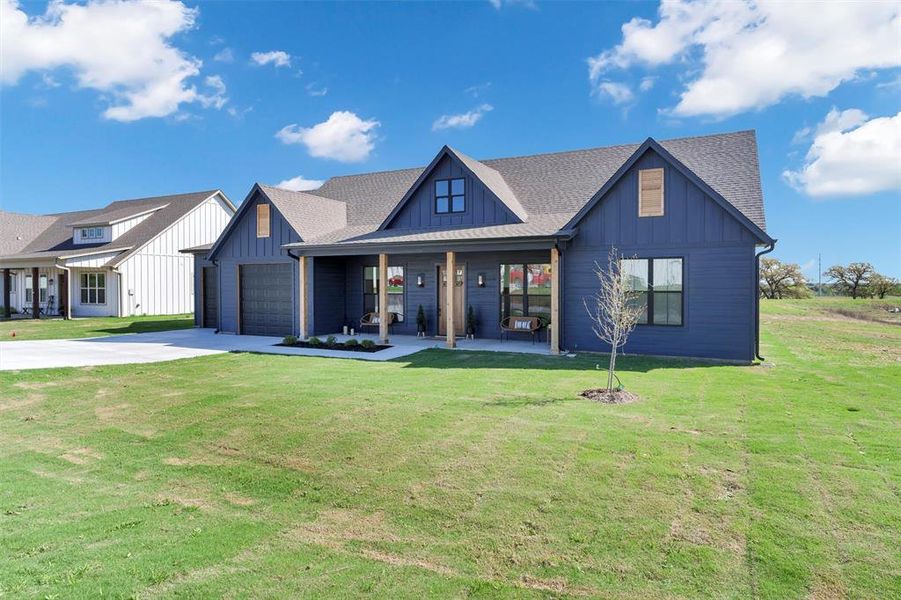 Front exterior of a new home in , Tolar, TX, highlighting curb appeal (Image 24).