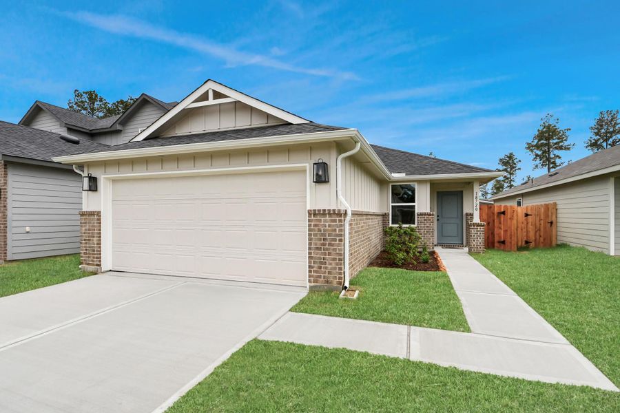 Front exterior of a new home in The Enclave at Spring Branch, Montgomery, TX, highlighting curb appeal (Image 19). Front exterior of a new home in The Enclave at Spring Branch, Montgomery, TX, highlighting curb appeal (Image 19).