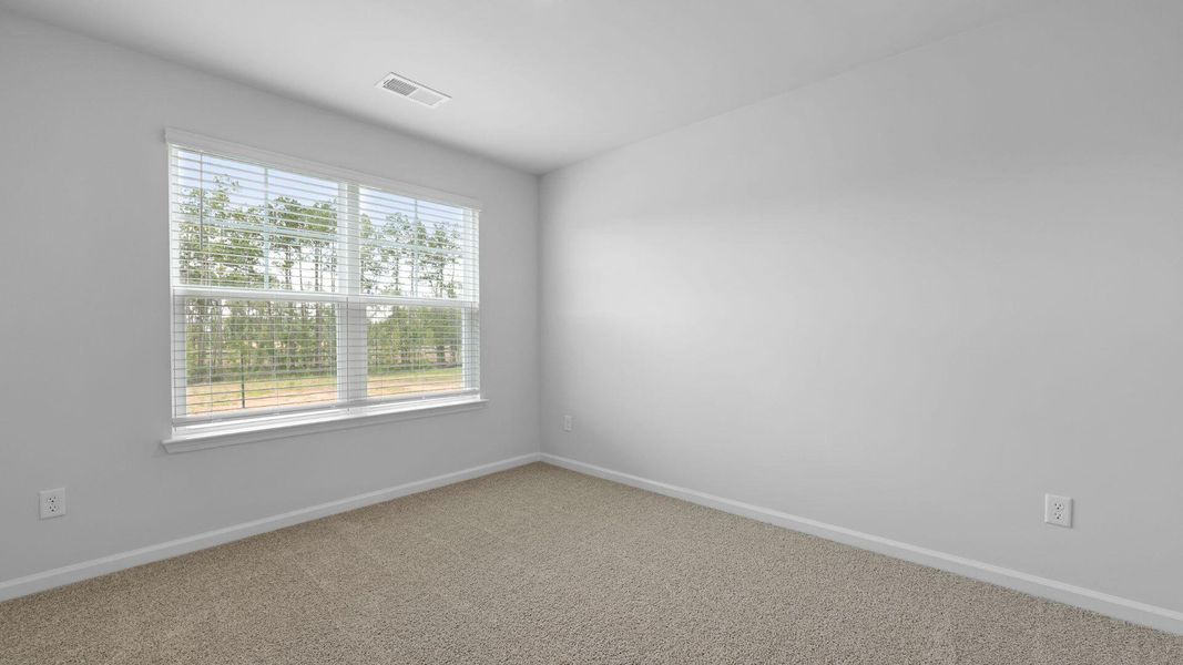 Spacious, unfurnished interior of a new home in Pineview North, Summerville (Image 28).
